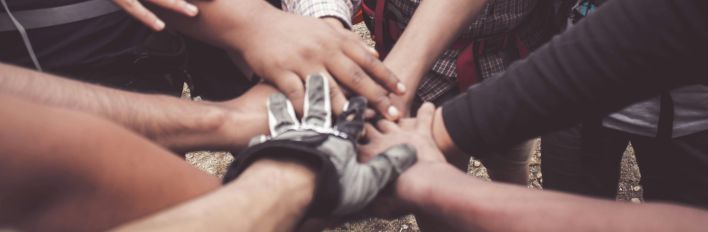 People Doing Group Hand Cheer